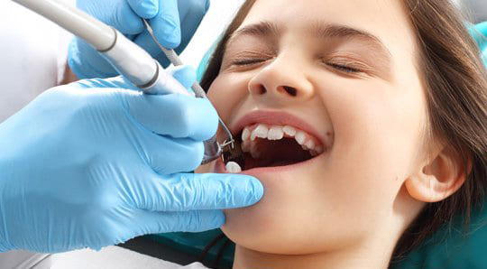 Удаление молочного зуба Томск Обруб смирнова улыбка томск стоматология